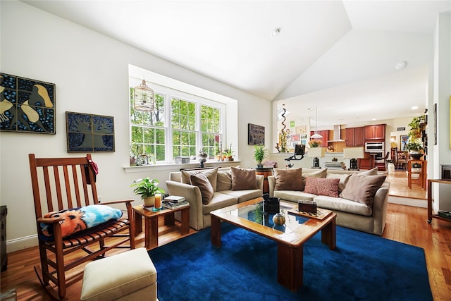 27 Sommerset Dr, Poughkeepsie, NY 12603 - living area with lofted ceiling and wood finished floors