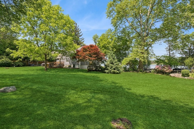129 W Lakeshore Dr, Carmel, NY 10512 - view of green lawn with a deck