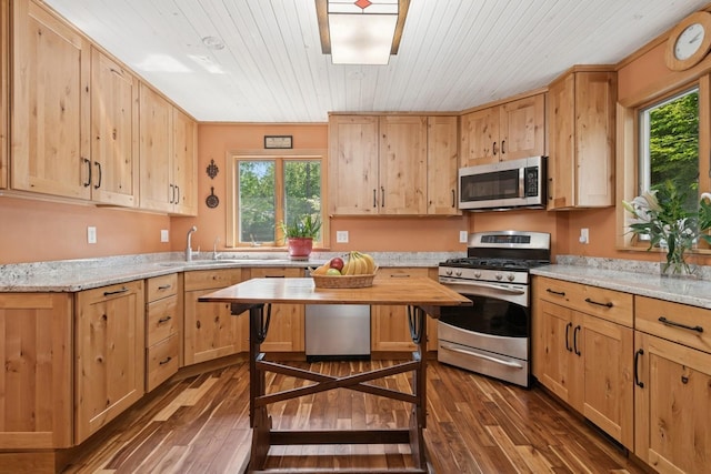 129 W Lakeshore Dr, Carmel, NY 10512 - kitchen featuring stainless steel appliances, a sink, dark wood-type flooring, light brown cabinetry, and wood ceiling