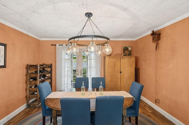 129 W Lakeshore Dr, Carmel, NY 10512 - dining area with wood finished floors, a chandelier, baseboards, and crown molding