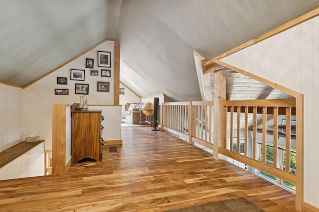 129 W Lakeshore Dr, Carmel, NY 10512 - hall featuring wood finished floors, lofted ceiling, and wood walls