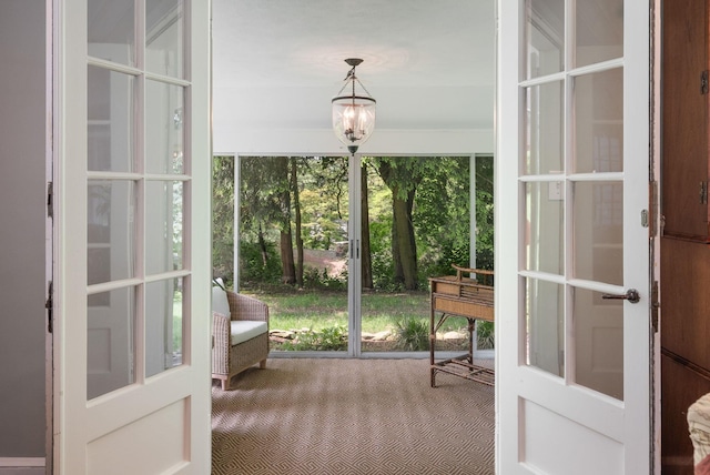 33 High Way, Chappaqua, NY 10514 - unfurnished sunroom featuring a chandelier