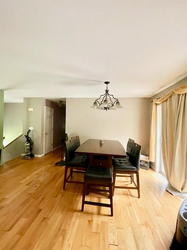 496 Minisink Tpke, Port Jervis, NY 12771 - dining space featuring light wood-type flooring and a chandelier