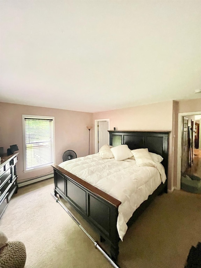 496 Minisink Tpke, Port Jervis, NY 12771 - bedroom with light colored carpet and a baseboard radiator