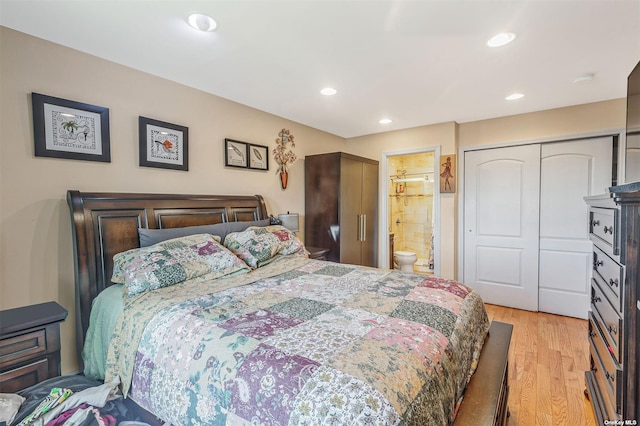 22820 Edgewood Ave, Laurelton, NY 11413 - bedroom with light wood-style flooring, a closet, recessed lighting, and connected bathroom