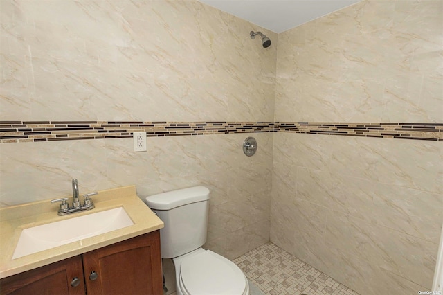 22820 Edgewood Ave, Laurelton, NY 11413 - bathroom with toilet, a tile shower, and vanity