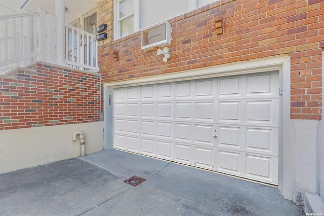 22820 Edgewood Ave, Laurelton, NY 11413 - garage featuring concrete driveway
