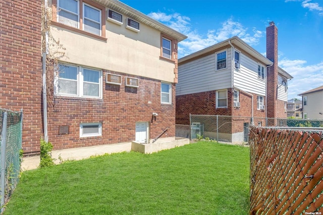22820 Edgewood Ave, Laurelton, NY 11413 - rear view of property with brick siding, stucco siding, and cooling unit
