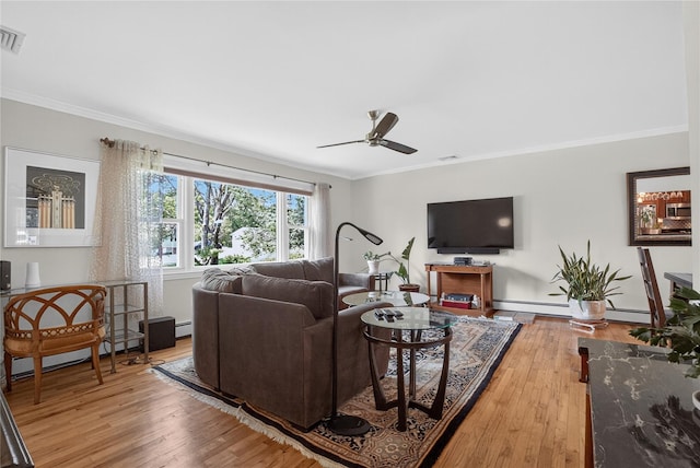 15 Richard Rd, Mahopac, NY 10541 - living area featuring crown molding, light wood finished floors, a ceiling fan, and a baseboard heating unit