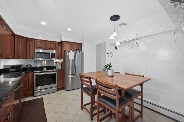 15 Richard Rd, Mahopac, NY 10541 - kitchen featuring stainless steel appliances, a baseboard radiator, crown molding, hanging light fixtures, and light tile patterned floors