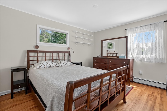 15 Richard Rd, Mahopac, NY 10541 - bedroom with a baseboard radiator, light wood-style floors, and ornamental molding