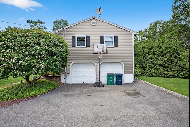 15 Richard Rd, Mahopac, NY 10541 - view of side of home featuring driveway and an attached garage