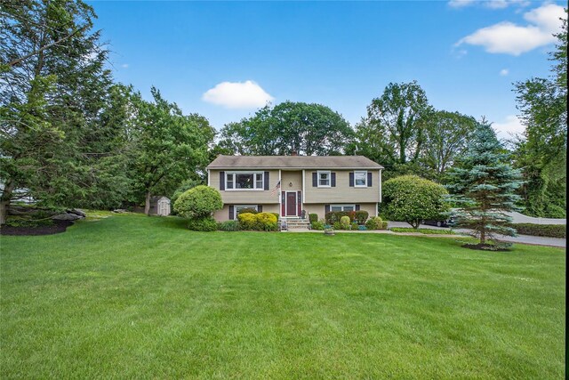 15 Richard Rd, Mahopac, NY 10541 - raised ranch with a storage shed and a front lawn