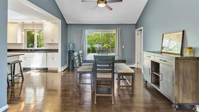 4 Bay View Dr W, Hampton Bays, NY 11946 - dining area with lofted ceiling, a ceiling fan, dark wood-type flooring, and baseboards