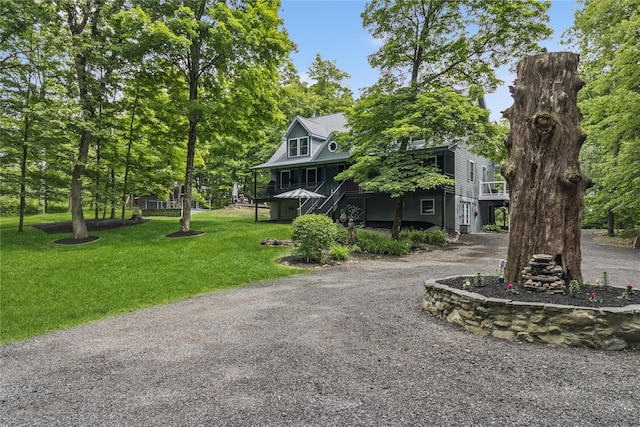 316 Myers Corners Rd, Wappingers Falls, NY 12590 - view of front of property with dirt driveway, a front yard, and stairway