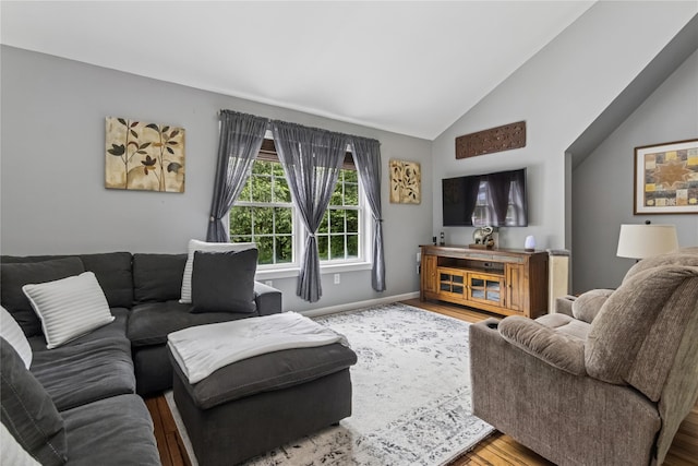 316 Myers Corners Rd, Wappingers Falls, NY 12590 - living area with wood finished floors, lofted ceiling, and baseboards