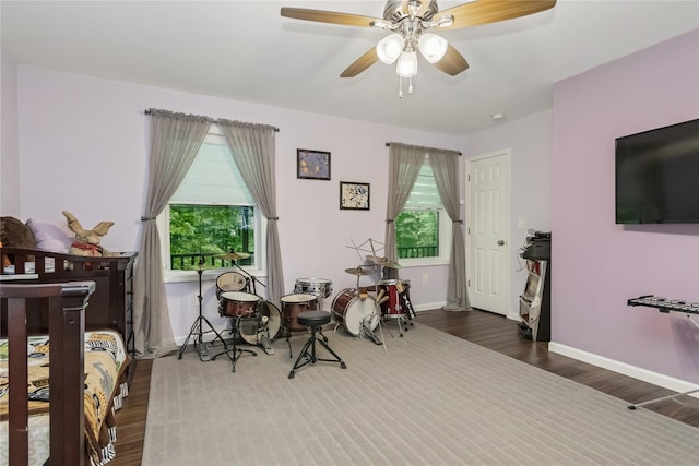 316 Myers Corners Rd, Wappingers Falls, NY 12590 - bedroom featuring dark wood-style flooring, baseboards, and a ceiling fan