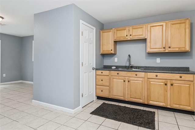 316 Myers Corners Rd, Wappingers Falls, NY 12590 - kitchen featuring a sink, light brown cabinetry, baseboards, and light tile patterned floors