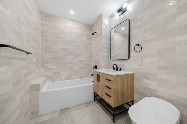 312 Fenimore St, Brooklyn, NY 11225 - bathroom with tile walls, vanity, shower / bathtub combination, toilet, and tile patterned flooring