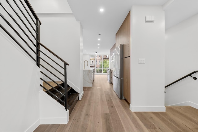 312 Fenimore St, Brooklyn, NY 11225 - entryway featuring light wood finished floors, baseboards, and recessed lighting