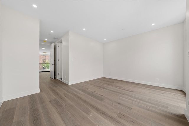 312 Fenimore St, Brooklyn, NY 11225 - empty room featuring light wood-type flooring, baseboards, and recessed lighting