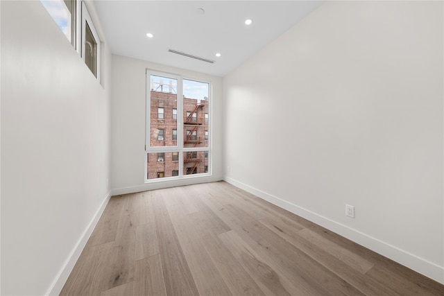 312 Fenimore St, Brooklyn, NY 11225 - empty room featuring baseboards, light wood finished floors, and recessed lighting