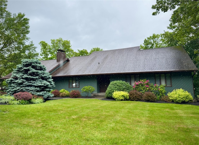 34 Brentwood Dr, Poughkeepsie, NY 12603 - view of front of property with a front yard and a chimney