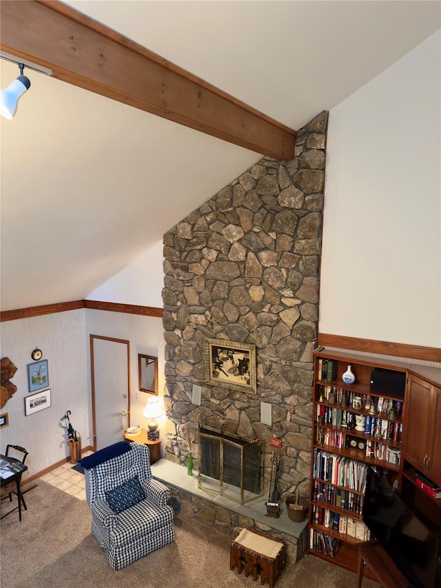 34 Brentwood Dr, Poughkeepsie, NY 12603 - carpeted living area featuring a stone fireplace