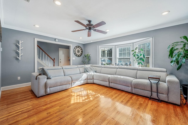 7 Daniel Ct, Lake Ronkonkoma, NY 11779 - living room with light wood-type flooring, recessed lighting, ceiling fan, crown molding, and baseboards