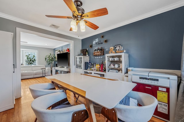 7 Daniel Ct, Lake Ronkonkoma, NY 11779 - kitchen featuring wood finished floors, crown molding, and a ceiling fan