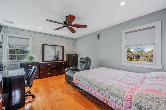 7 Daniel Ct, Lake Ronkonkoma, NY 11779 - bedroom with wallpapered walls, wood finished floors, an office area, recessed lighting, and ceiling fan