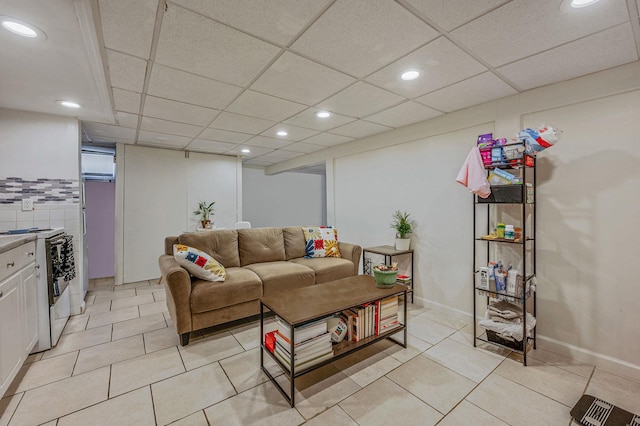 7 Daniel Ct, Lake Ronkonkoma, NY 11779 - living room featuring recessed lighting, light tile patterned flooring, and a drop ceiling