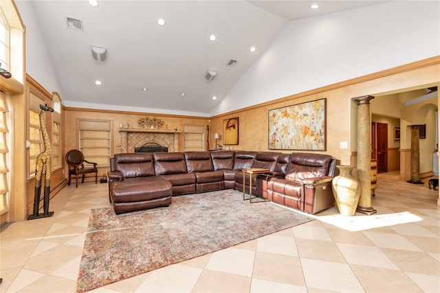 1338 Kearney Ave, Bronx, NY 10465 - living area featuring high vaulted ceiling, recessed lighting, ornate columns, arched walkways, and a fireplace