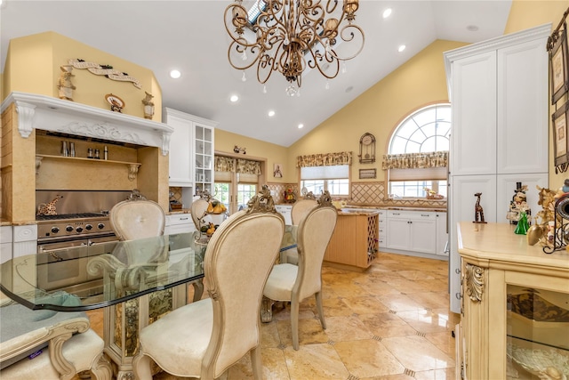 1338 Kearney Ave, Bronx, NY 10465 - dining area featuring a chandelier, recessed lighting, high vaulted ceiling, and light tile patterned floors