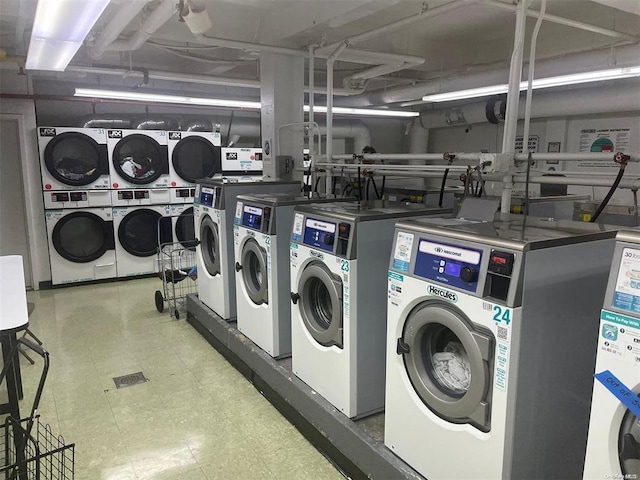160-10 89th Ave Unit N-2D, Jamaica Hills, NY 11432 - communal laundry room featuring stacked washer and clothes dryer, washing machine and clothes dryer, and tile patterned floors
