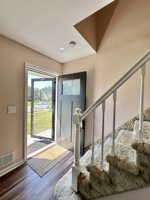 7 Mindy Ln, Jericho, NY 11590 - foyer featuring wood finished floors, stairway, and recessed lighting
