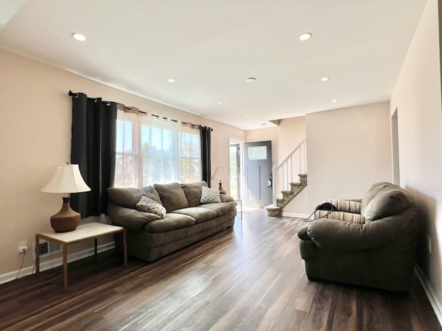 7 Mindy Ln, Jericho, NY 11590 - living room with dark wood-type flooring, stairs, and recessed lighting