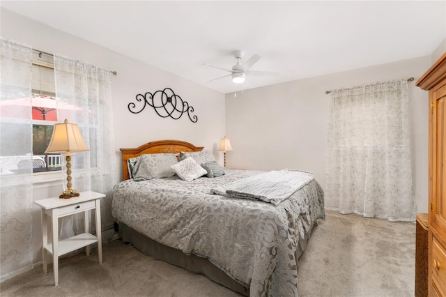 14FELWAYDRIVE Felway Dr Unit 14, Coram, NY 11727 - bedroom featuring light carpet and a ceiling fan