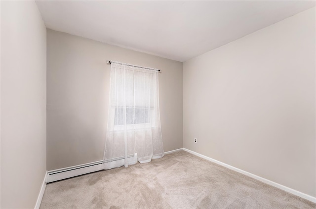 14FELWAYDRIVE Felway Dr Unit 14, Coram, NY 11727 - empty room with baseboard heating, carpet floors, and baseboards
