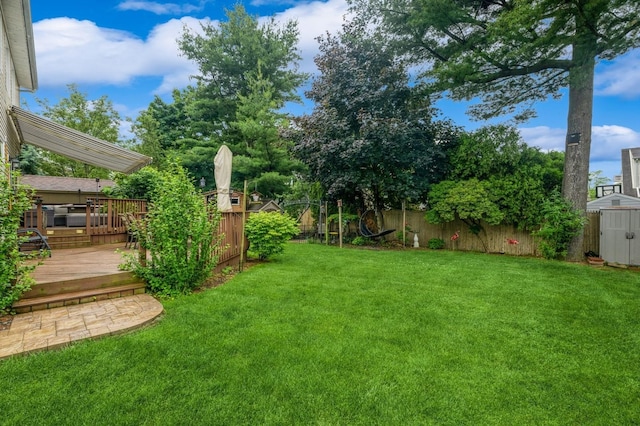 74 Miles Ave, Albertson, NY 11507 - fenced backyard with a shed and a wooden deck