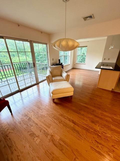 1010 Washington Grn Unit 1010, New Windsor, NY 1255312553 - living area featuring wood finished floors