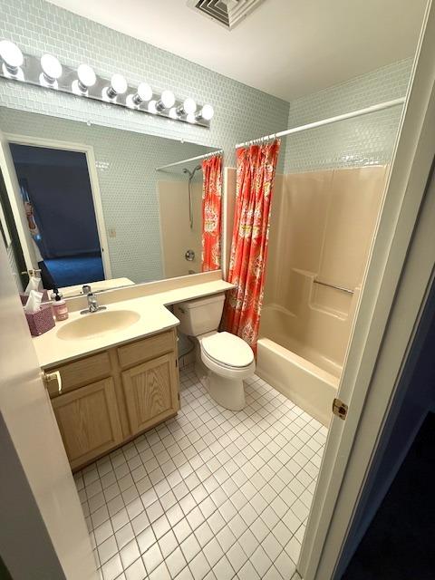 1010 Washington Grn Unit 1010, New Windsor, NY 1255312553 - full bath with tile patterned floors, shower / bath combo, and vanity