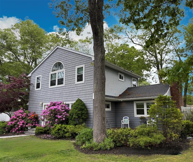 1 Roberta St, East Patchogue, NY 11772 - view of side of home with a yard