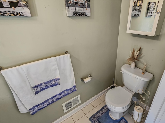 2717 Colonial Dr, New Windsor, NY 12553 - bathroom with toilet, tile patterned flooring, and baseboards