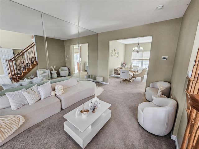 2717 Colonial Dr, New Windsor, NY 12553 - carpeted living area with stairs, a chandelier, and baseboards