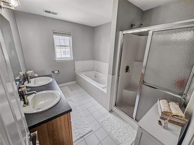 2717 Colonial Dr, New Windsor, NY 12553 - full bathroom with tile patterned floors, a bath, a stall shower, double vanity, and baseboards