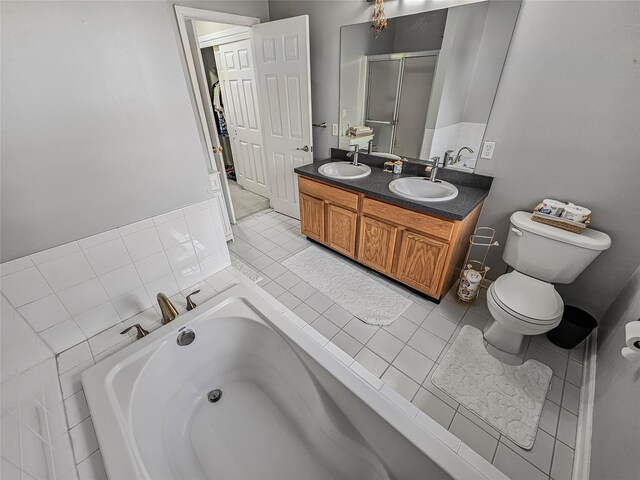 2717 Colonial Dr, New Windsor, NY 12553 - full bathroom featuring a garden tub, double vanity, toilet, tile patterned floors, and a shower with door