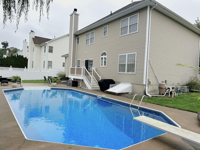 2717 Colonial Dr, New Windsor, NY 12553 - rear view of house featuring a patio area