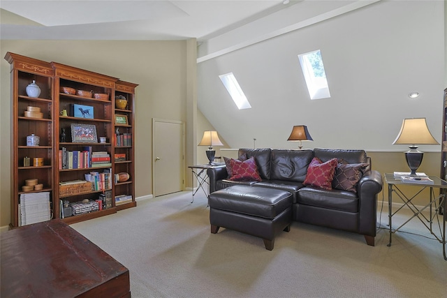 17 Deer Tree Ln, Briarcliff Manor, NY 10510 - carpeted living room featuring a skylight, vaulted ceiling, and baseboards