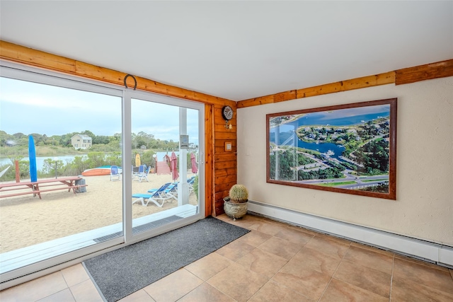 19 Cold Spring Ct, Southampton, NY 11968 - doorway with a baseboard radiator, healthy amount of natural light, and a water view